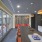 Resident lounge and kitchen at The District apartments for rent in Pittsburgh, PA, featuring a loung counter with a sink.