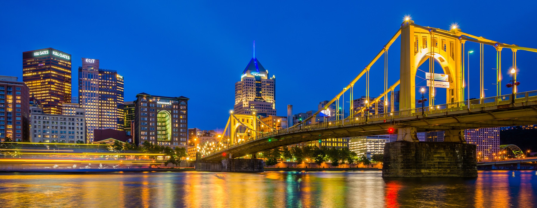 Nighttime skyline shot of East bridge in Pittsburgh.